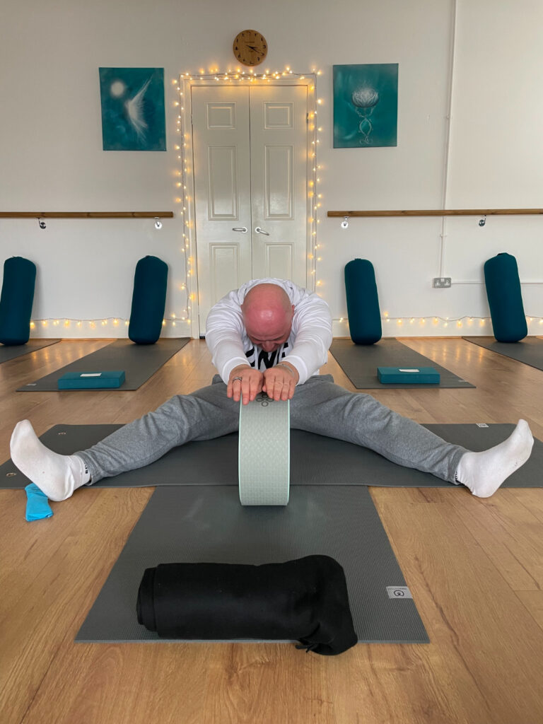 IMG_0460 Using a yoga wheel for backbends and flexibility at Toni Marie Yoga Studio