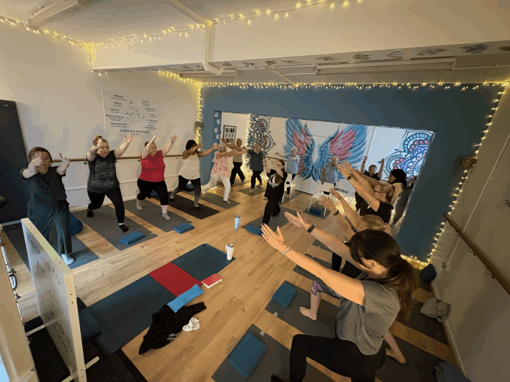 Clients practising yoga together at Toni Marie Yoga Studio in Wigan Clients practising yoga together at Toni Marie Yoga Studio in Wigan
