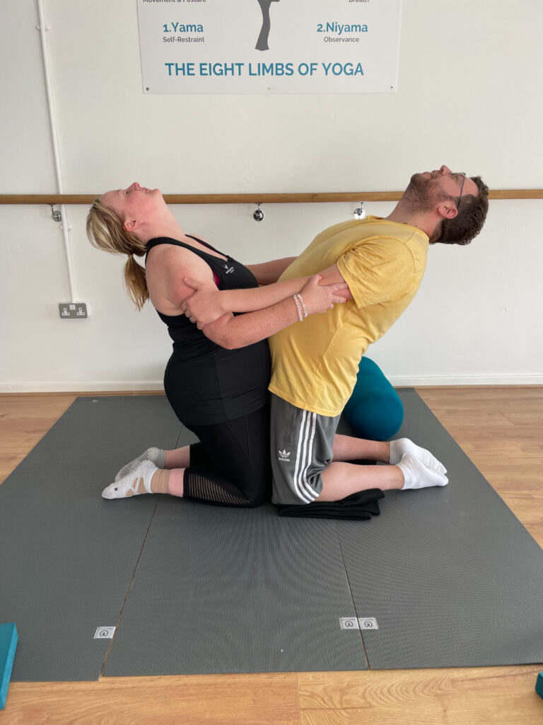 IMG_5811 Partner yoga pose for connection and balance at Toni Marie Yoga Studio